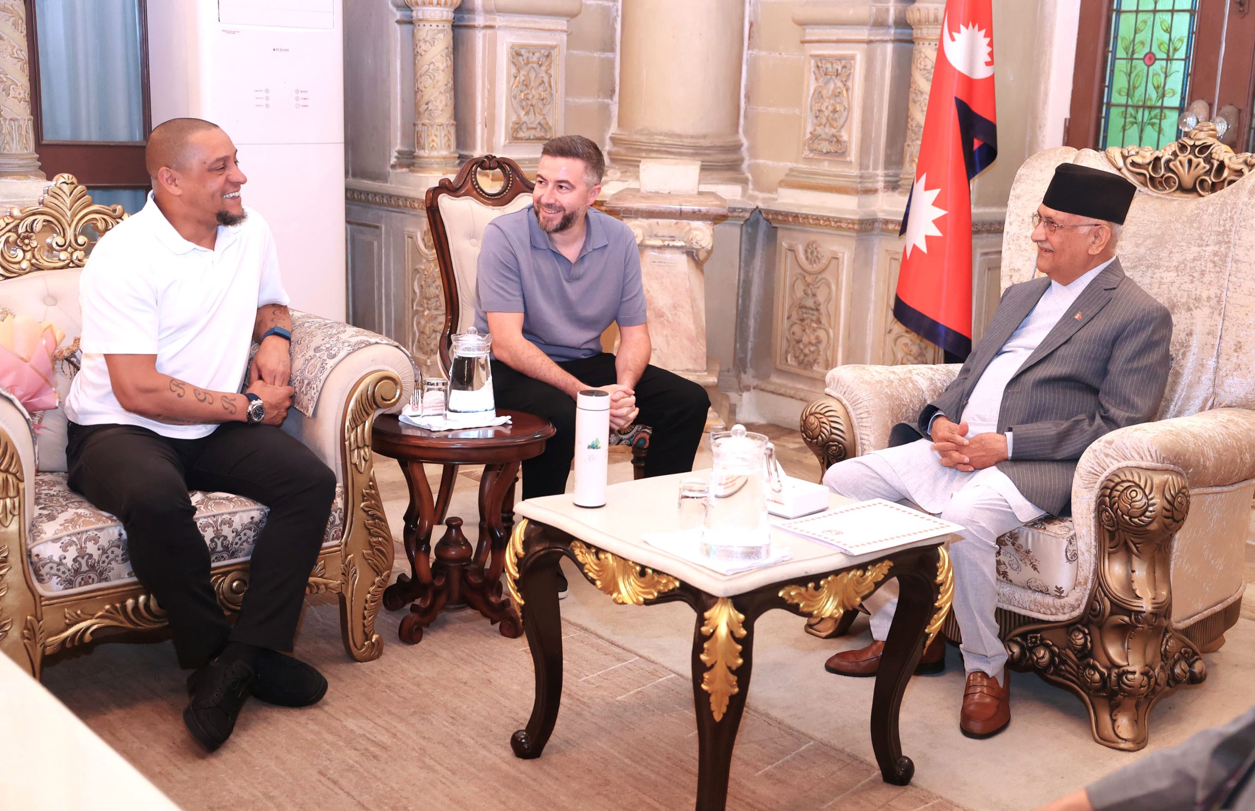 Brazilian star footballer Roberto Carlos calls on PM Oli
